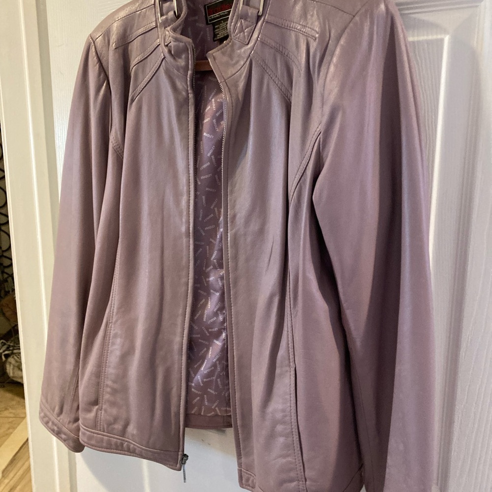 Lavender leather short zippered jacket . Beautiful details on collar and sleeve.